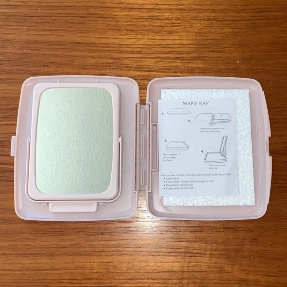Mary Kay NWOT pink compact travel mirror. In original wrapping.